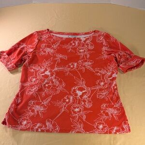 Women’s top by Rebecca Malone, floral pattern size large, cuffed, short sleeves